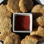 Crispy golden Asian-style chicken nuggets with dipping sauce.