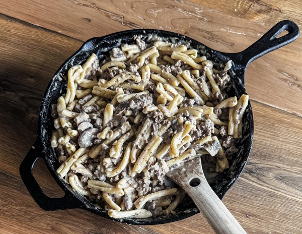 Ground Beef Stroganoff served over spiral noodles.