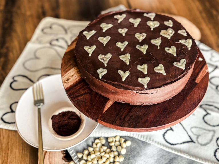 Moist Chocolate Cake with Rich Chocolate Buttercream Adorned in white hearts