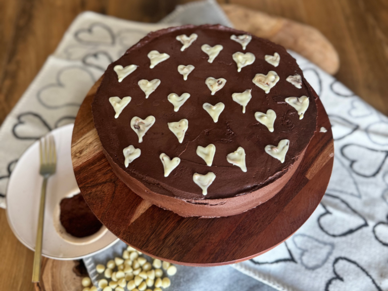 Rich and creamy fudgy chocolate buttercream frosting swirled into luscious peaks, perfect for cakes, cupcakes, or cookies.