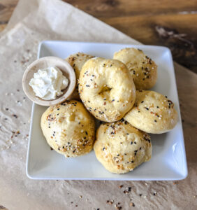 High protein bagels made with cottage cheese, flour, egg, and everything bagel seasoning, freshly baked and golden brown.